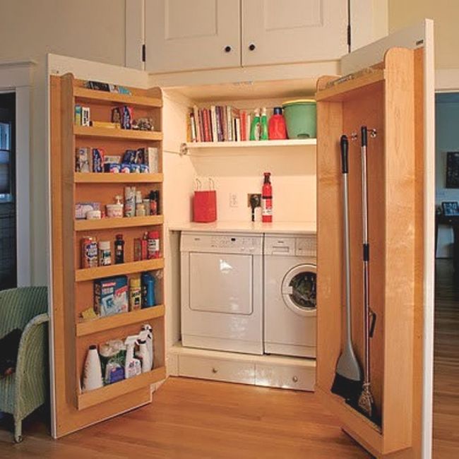 Clever deep shelving in laundry cabinet doors can be used to store equipment and laundry supplies