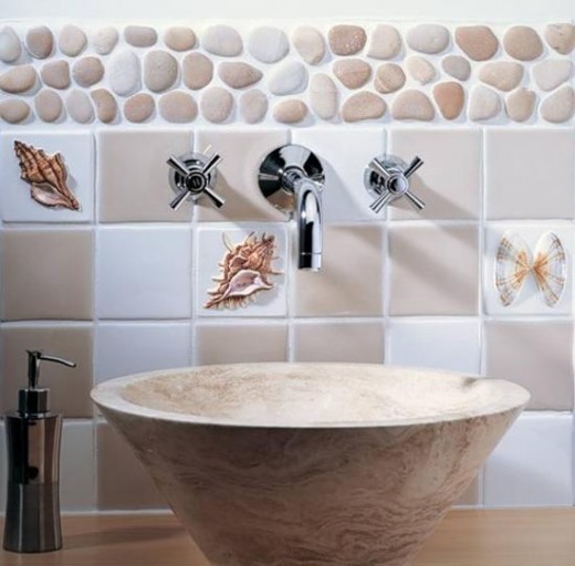 Polished stones can also be used in splashback areas. Tiles with shell themes are available, but why not use real shells instead!